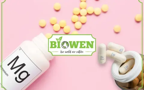 Biała butelka z magnezem, kapsułki z witaminą D3 i żółte tabletki. Logo "Biowen" sugeruje naturalne suplementy, być może zawierające kwas orotowy.